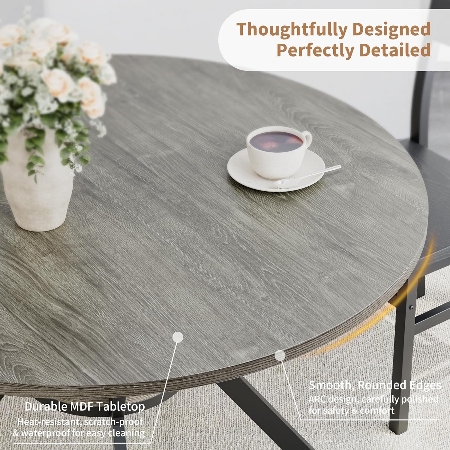 Close-up of the grey MDF tabletop texture and rounded edge with a cup and vase