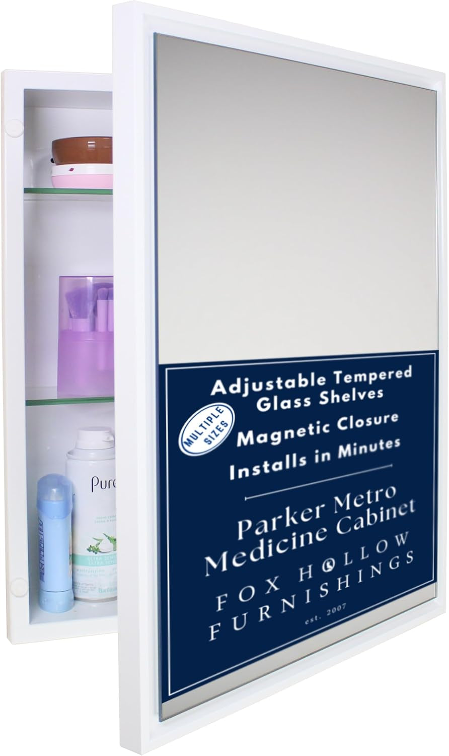 White recessed medicine cabinet with mirrored door partly open, showing two glass shelves with toiletries.