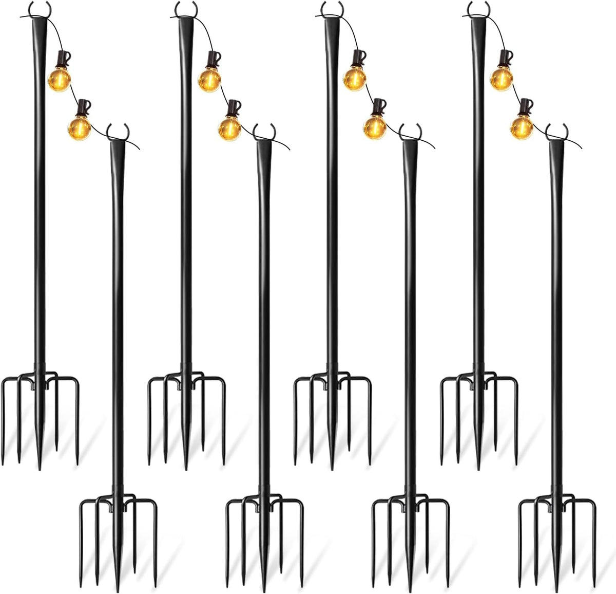 Four black metal string-light poles with forked ground stakes and top hooks, three bulbs hanging on each.