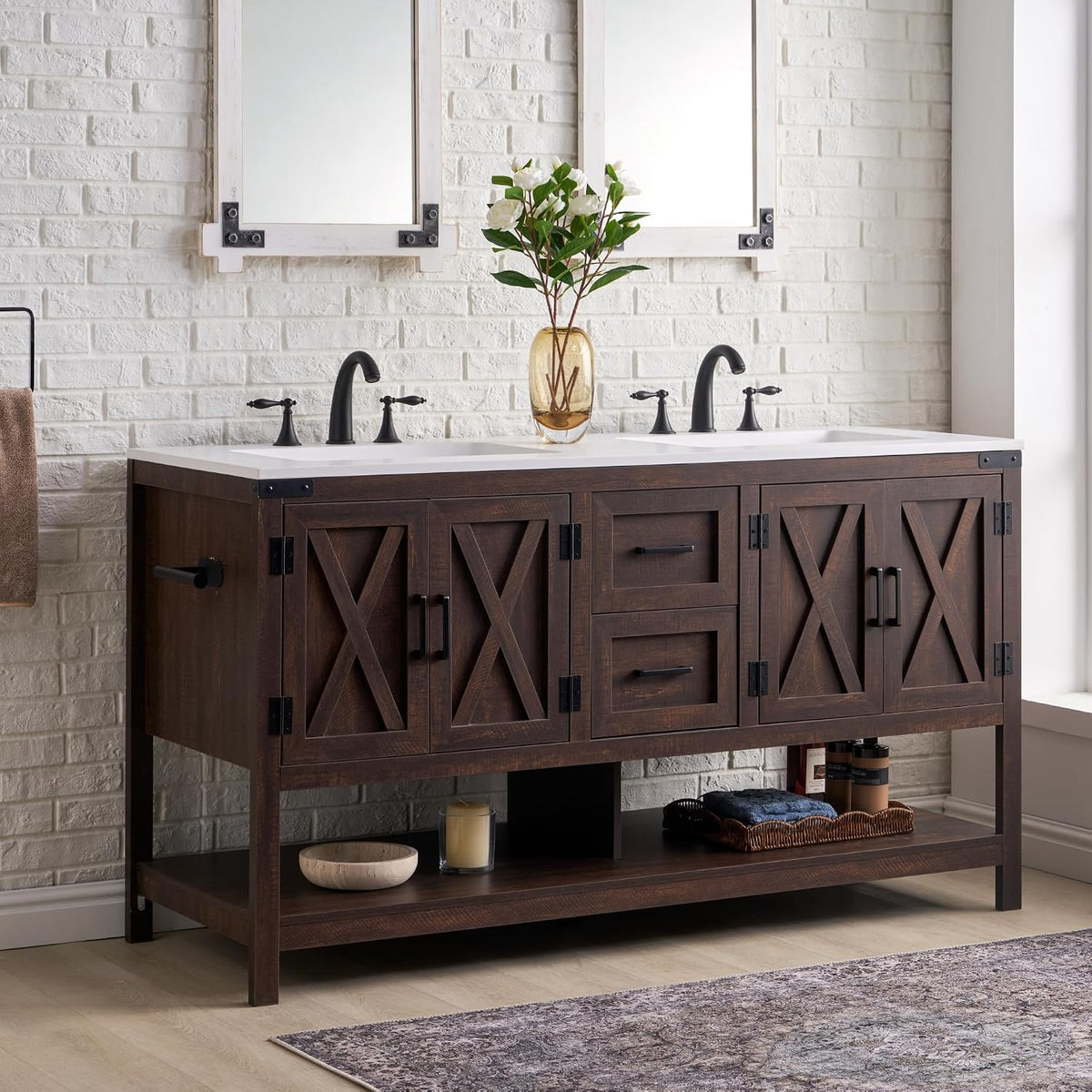 Angled view of a dark wood double-sink vanity against a white brick wall with faucets and decorative items.