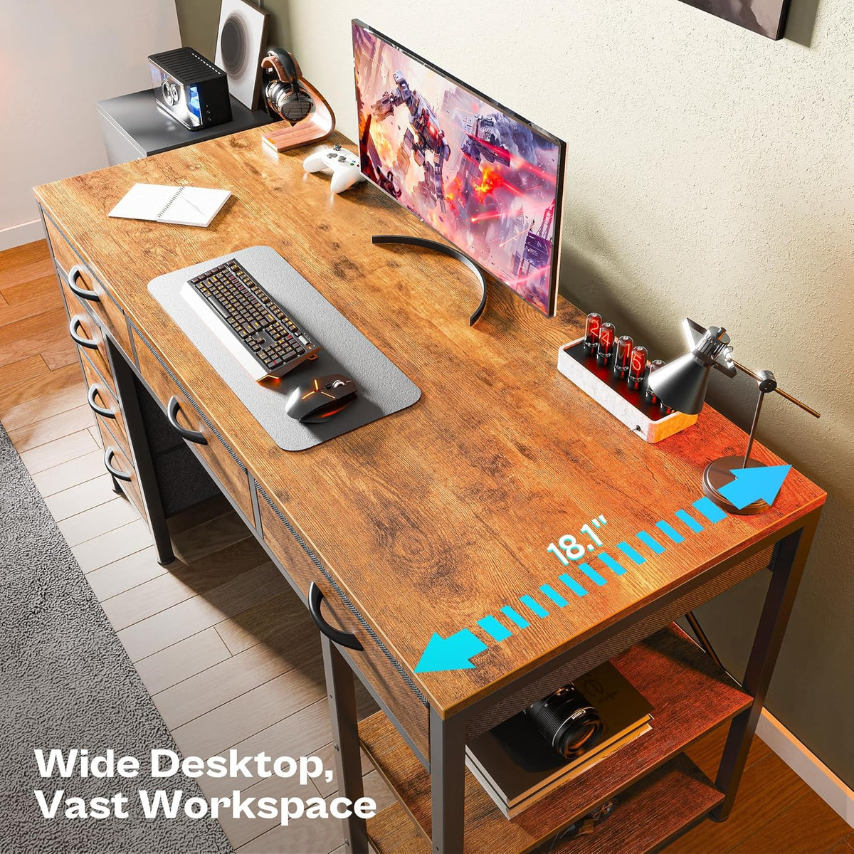 Overhead close view of brown particleboard desktop showing an 18-inch depth arrow and items on the work surface
