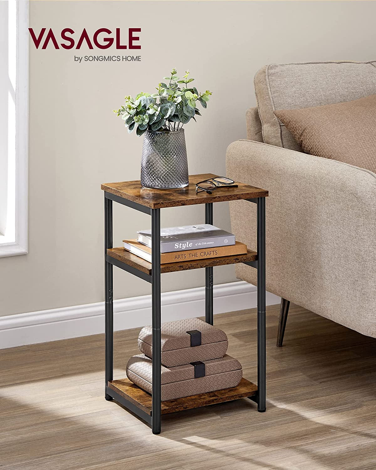 Side table placed beside a sofa in a living room setting showing full-height front view