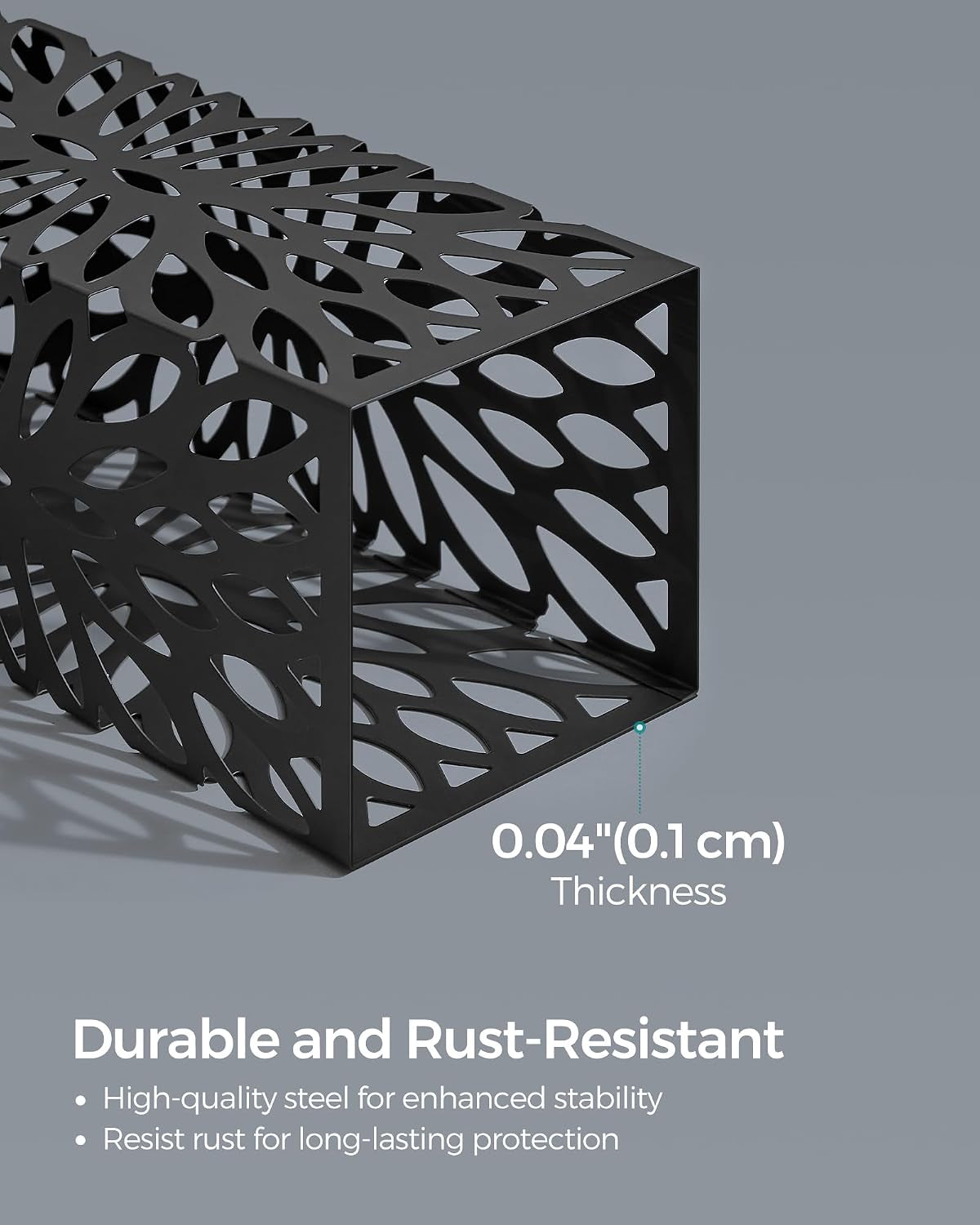 Close-up of the umbrella stand corner showing the leaf cutout pattern and black metal finish