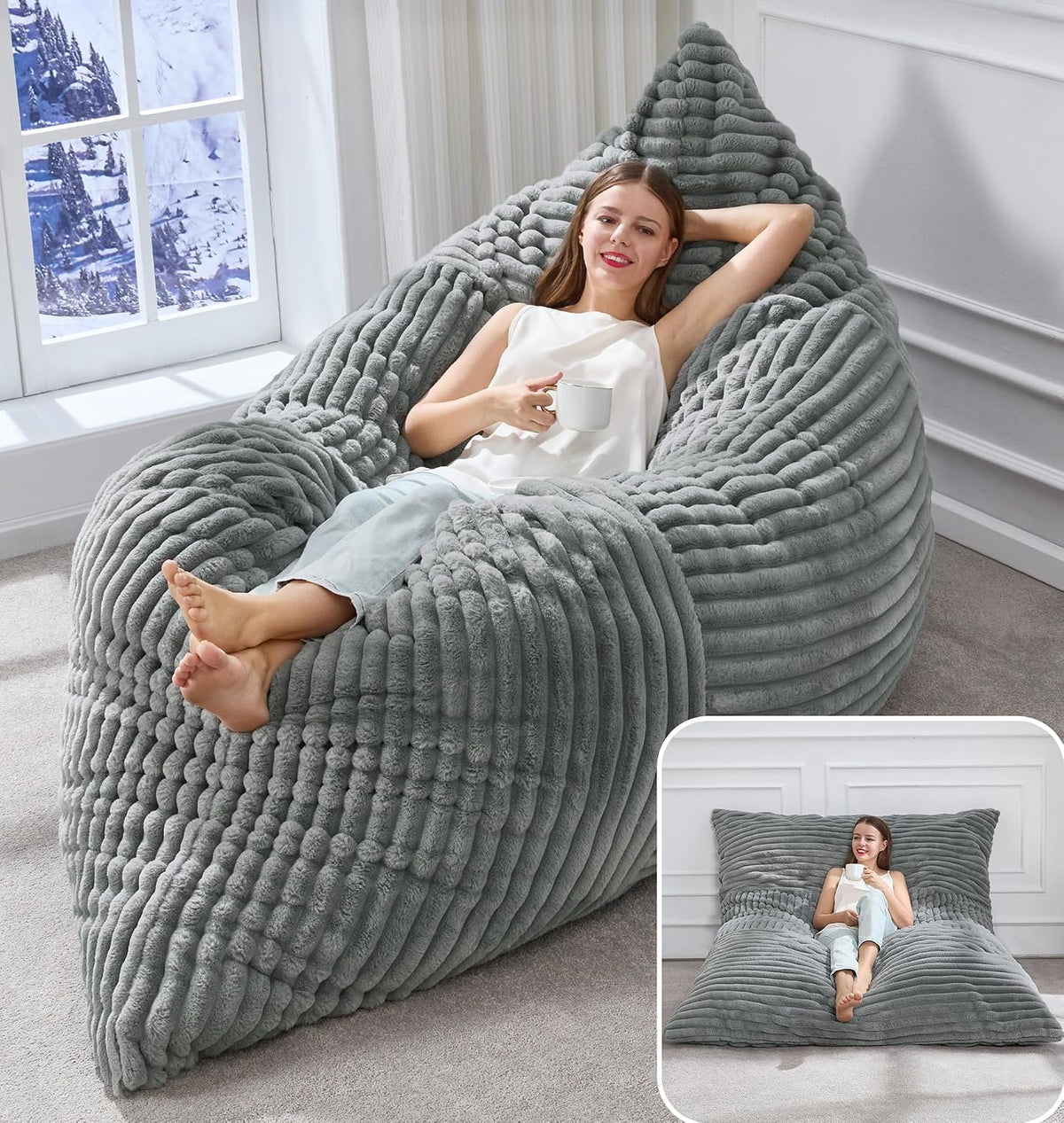 Woman relaxing on a ribbed light gray memory-foam bag chair with legs extended and an inset of the bed-like setup.