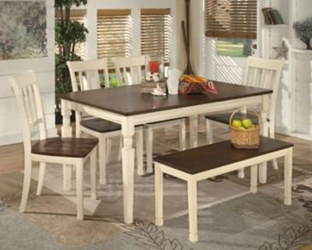 Dining room scene with a rectangular table, chairs and a matching cream-and-dark-brown bench.