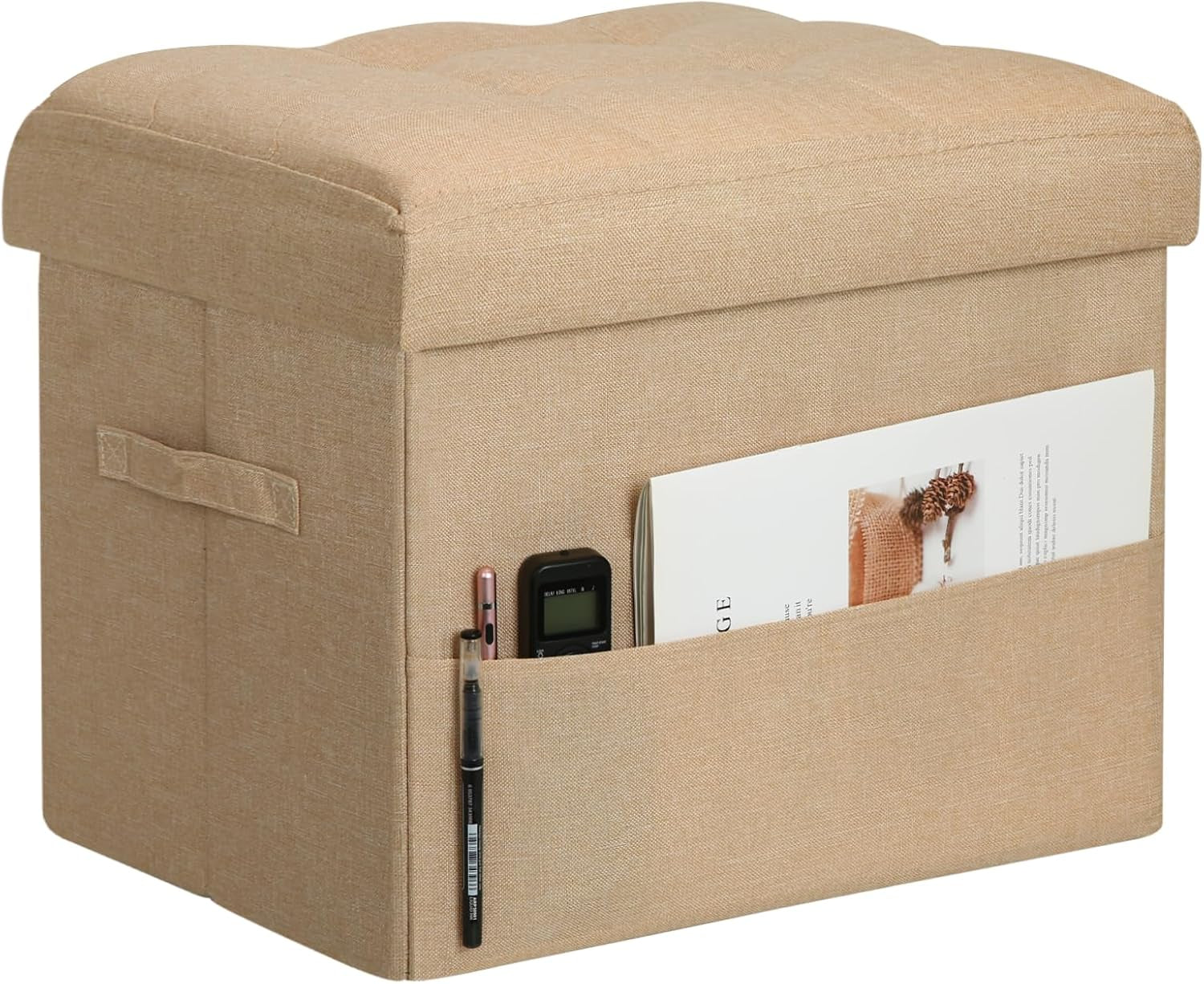 Beige linen-look storage ottoman angled to show tufted top and a side pocket with a magazine and pens.