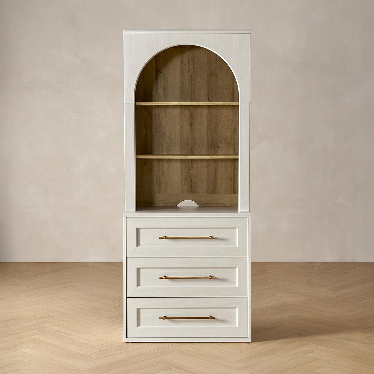 Off-white tall storage cabinet with hutch, three drawers at base and arched open shelves showing wood-toned interior.