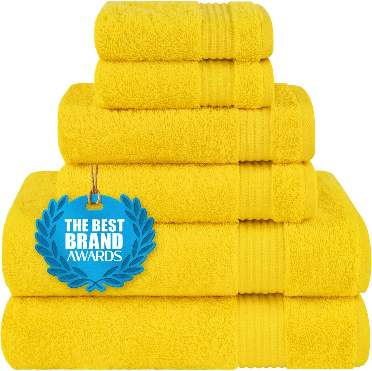 Front-facing stack of bright yellow towels folded in descending sizes with visible ribbed trim.