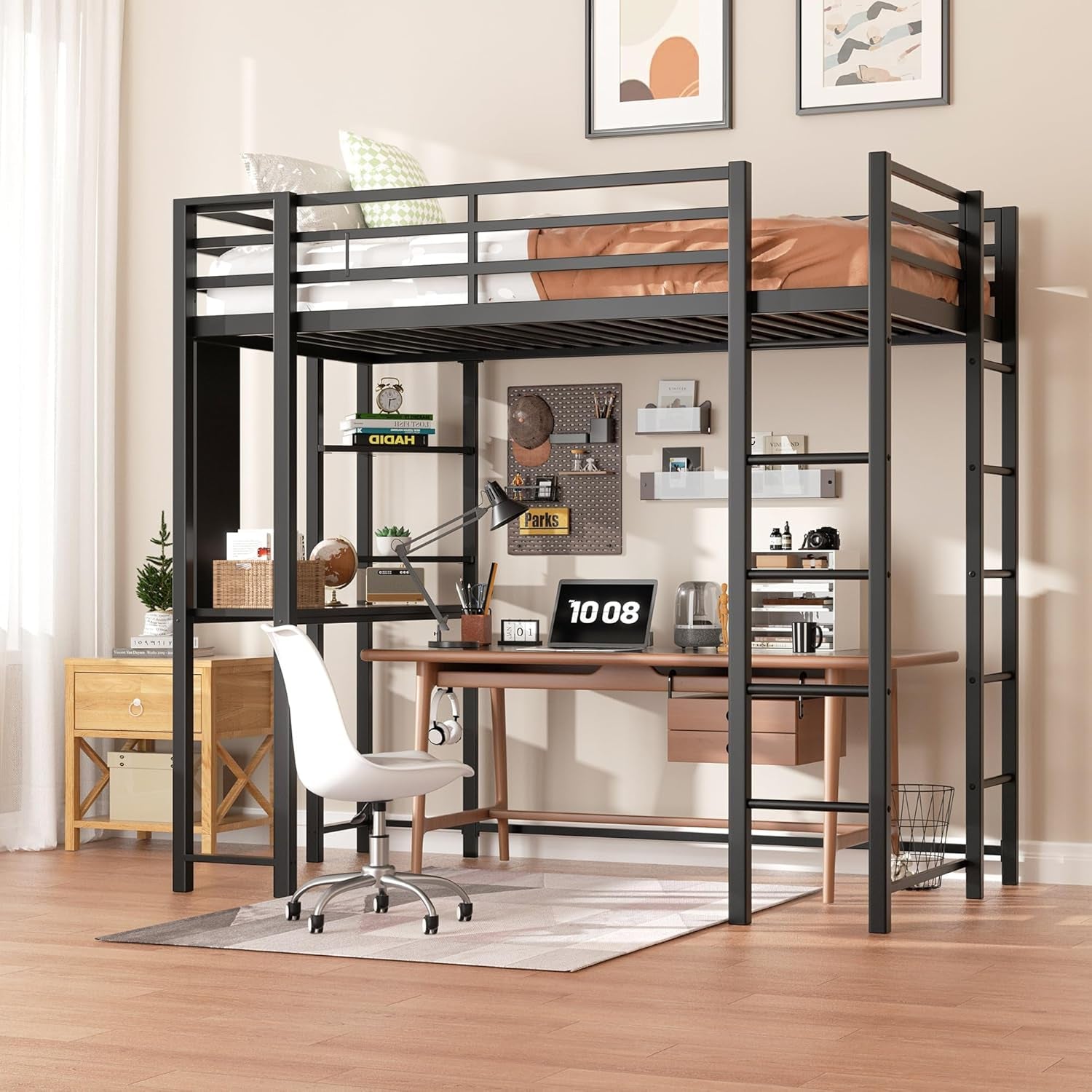 Angled view of black metal loft bed with full-length guardrail and study area below.
