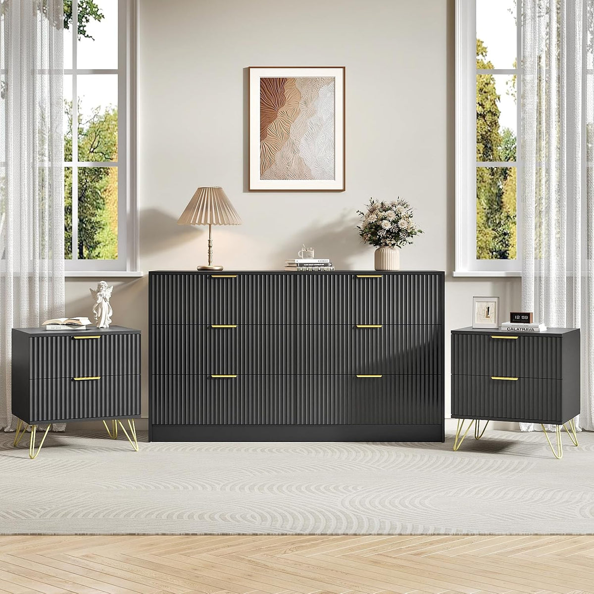Same bedroom setup showing the dresser and two nightstands in a dark charcoal finish with gold legs and handles.