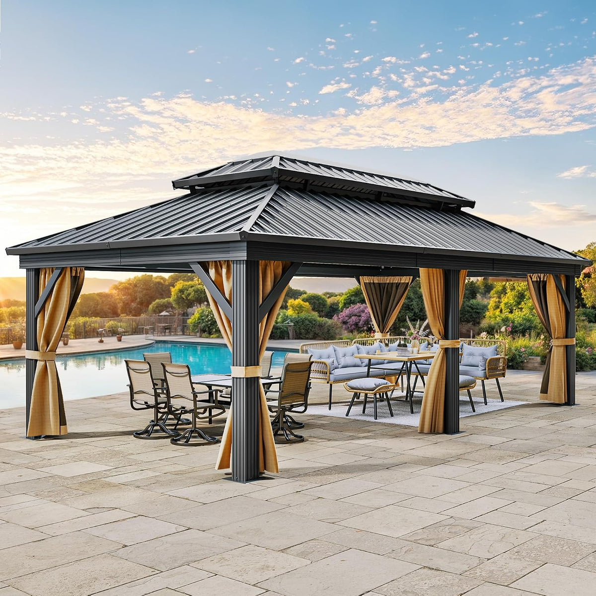 Gray double-roof gazebo beside a pool with tan curtains tied to posts and outdoor dining and lounge furniture underneath.