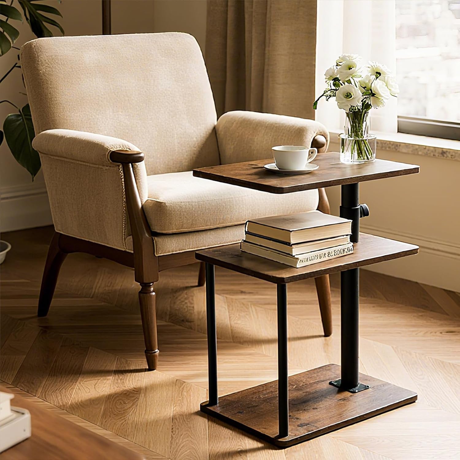 Wood-finish C-shape side table beside an armchair, styled with a cup and vase on the top shelf