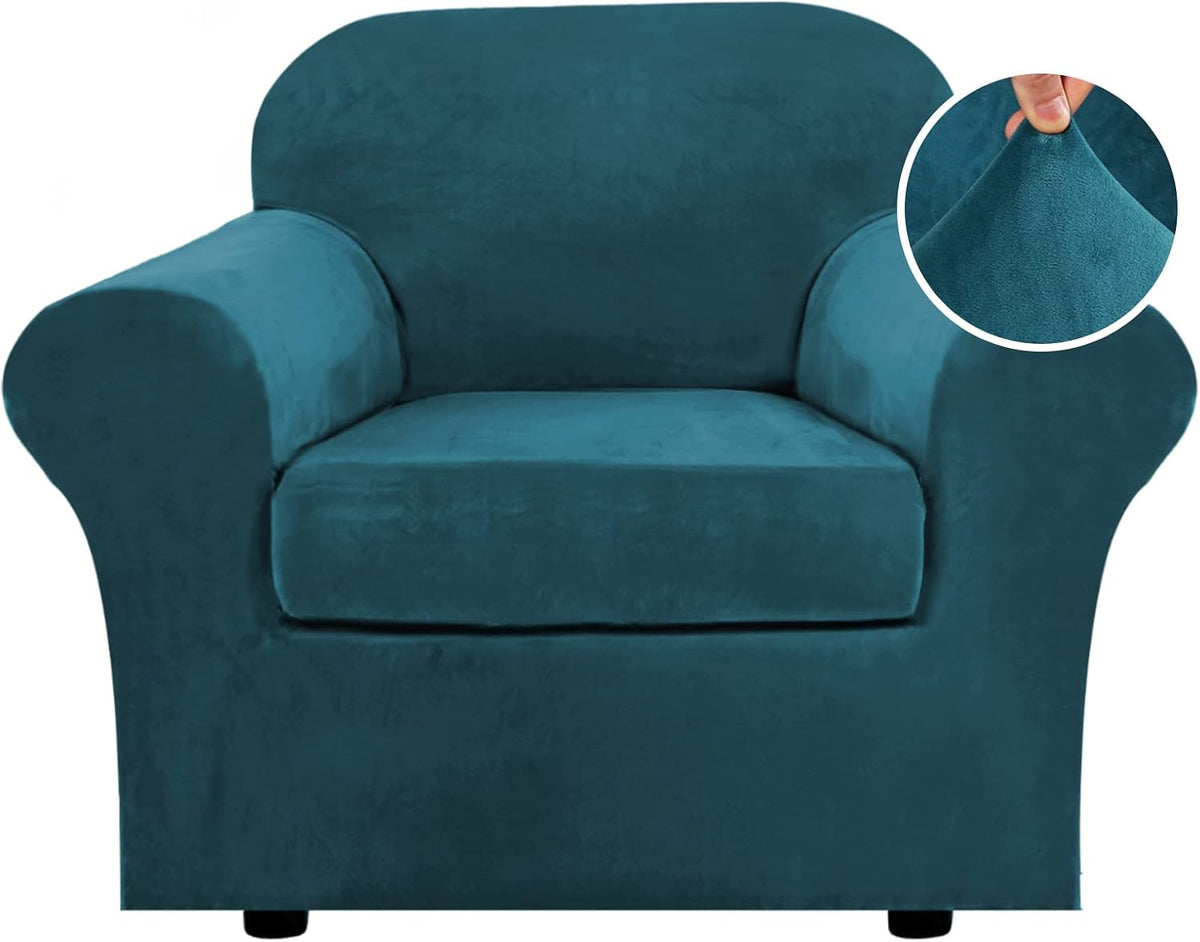 Three-quarter frontal view of a single-seat deep teal armchair with inset showing a hand stretching the soft fabric.