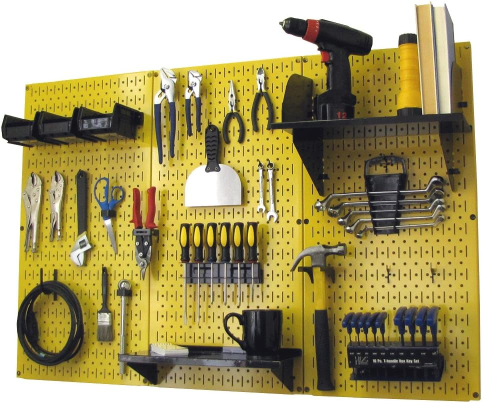 Yellow metal pegboard organized with hand tools, a black mug on a shelf, and blue storage holders.