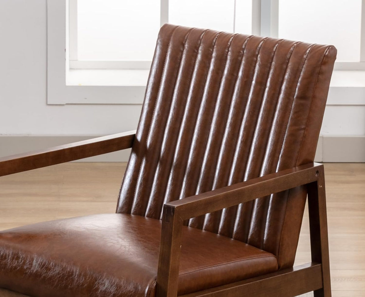 Close-up of the chair’s vertical channel‑stitched back, smooth seat cushion, and straight wooden armrest