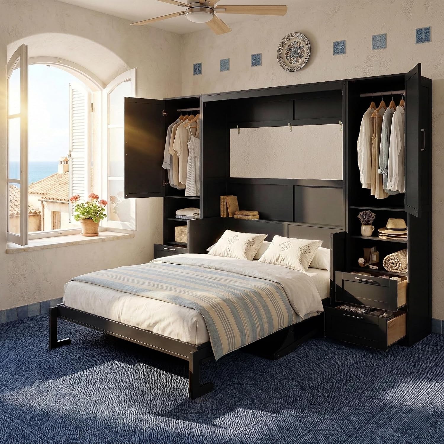 Styled bedroom with black wall bed open, made bed with linens and cabinets showing hanging clothes and shelving.