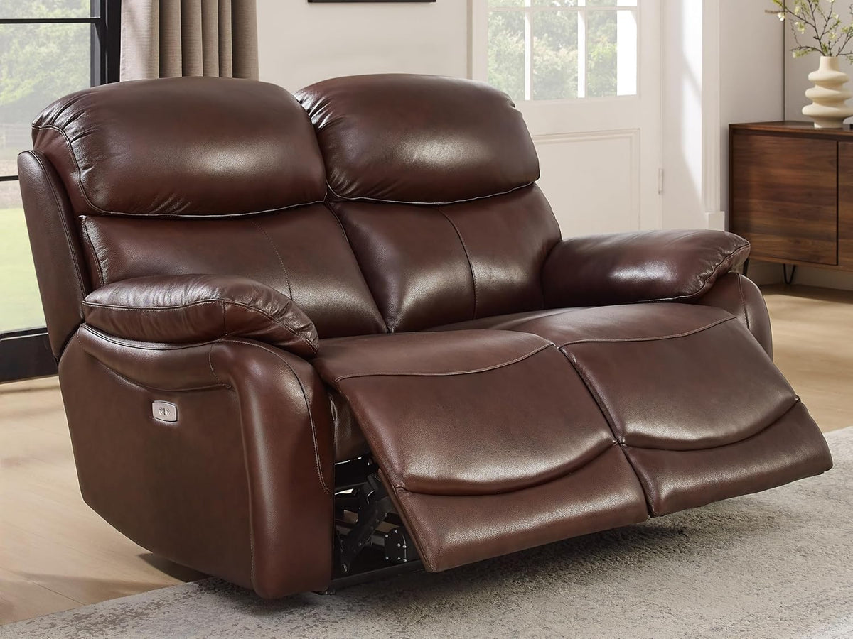 Close side/front view of a brown leather reclining loveseat with one footrest extended.