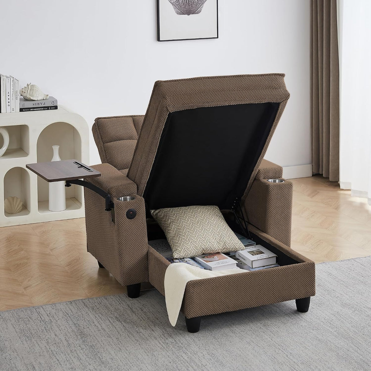 Brown chenille chaise lounge with storage compartment open showing pillow and books and swivel tray extended