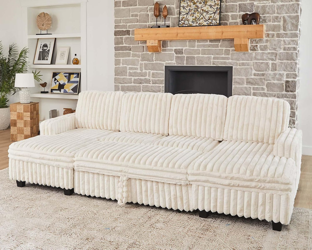 Cream corduroy modular sofa front-facing beneath a wood mantel and stone fireplace on a patterned rug.