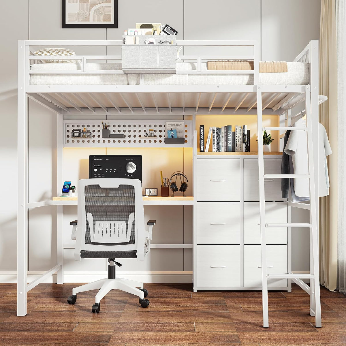 Straight-on view of the loft bed workspace with lit back panel, monitor, shelving and storage drawers