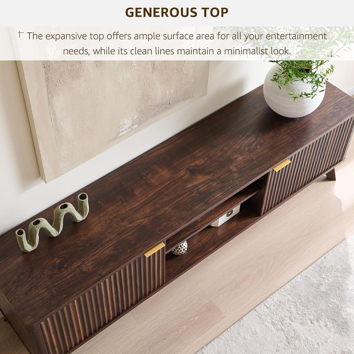 Top-down view of dark walnut TV stand showing expansive top surface and gold-accent handles
