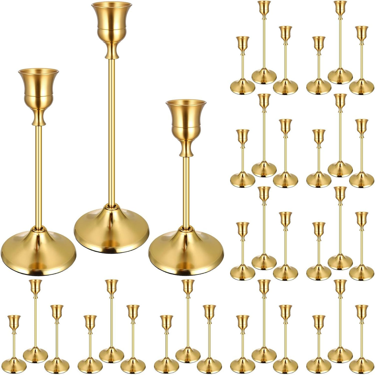 Grouped gold metal taper candle holders in three heights arranged on a white background