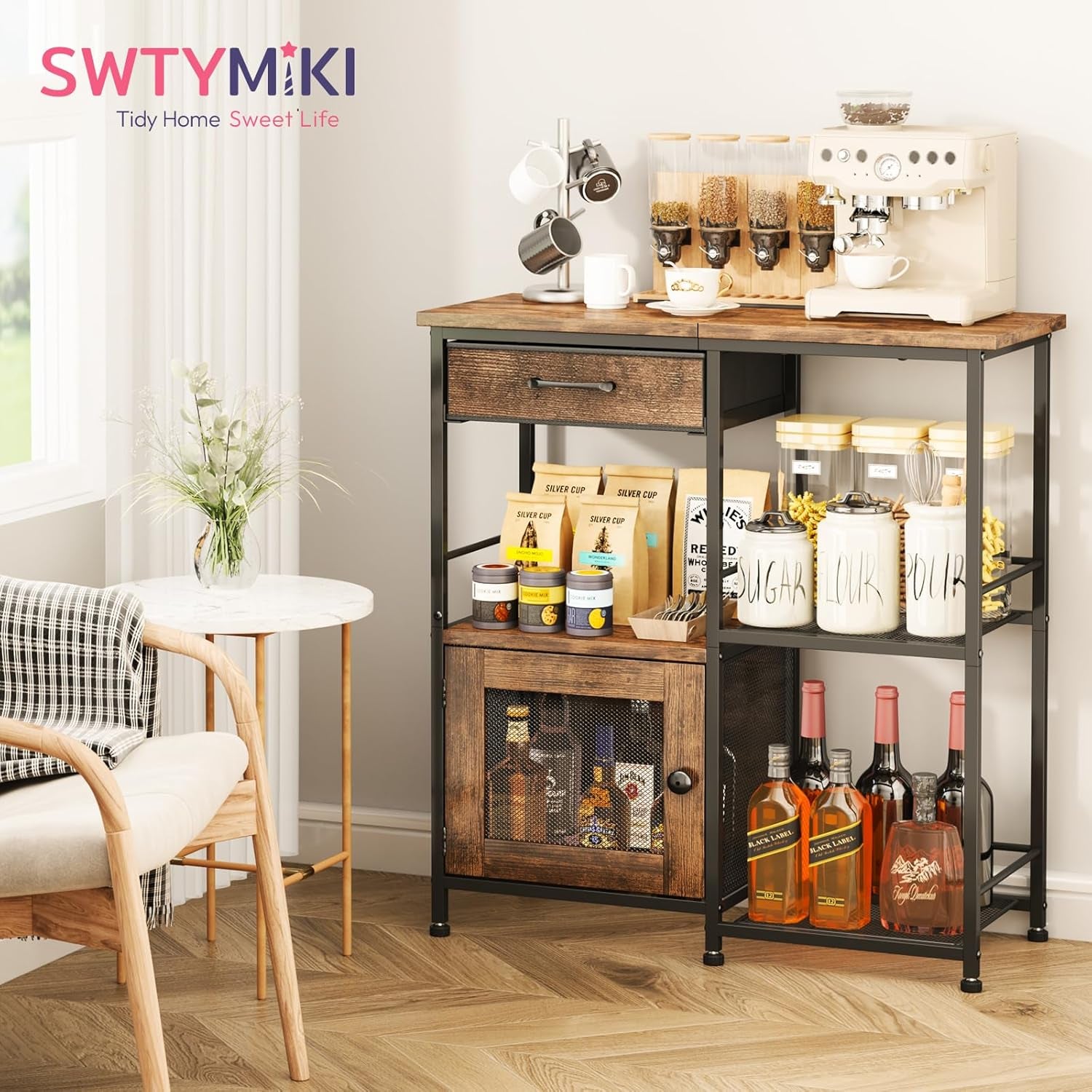 Buffet styled in a living corner beside a chair and small table, topped with a coffee machine