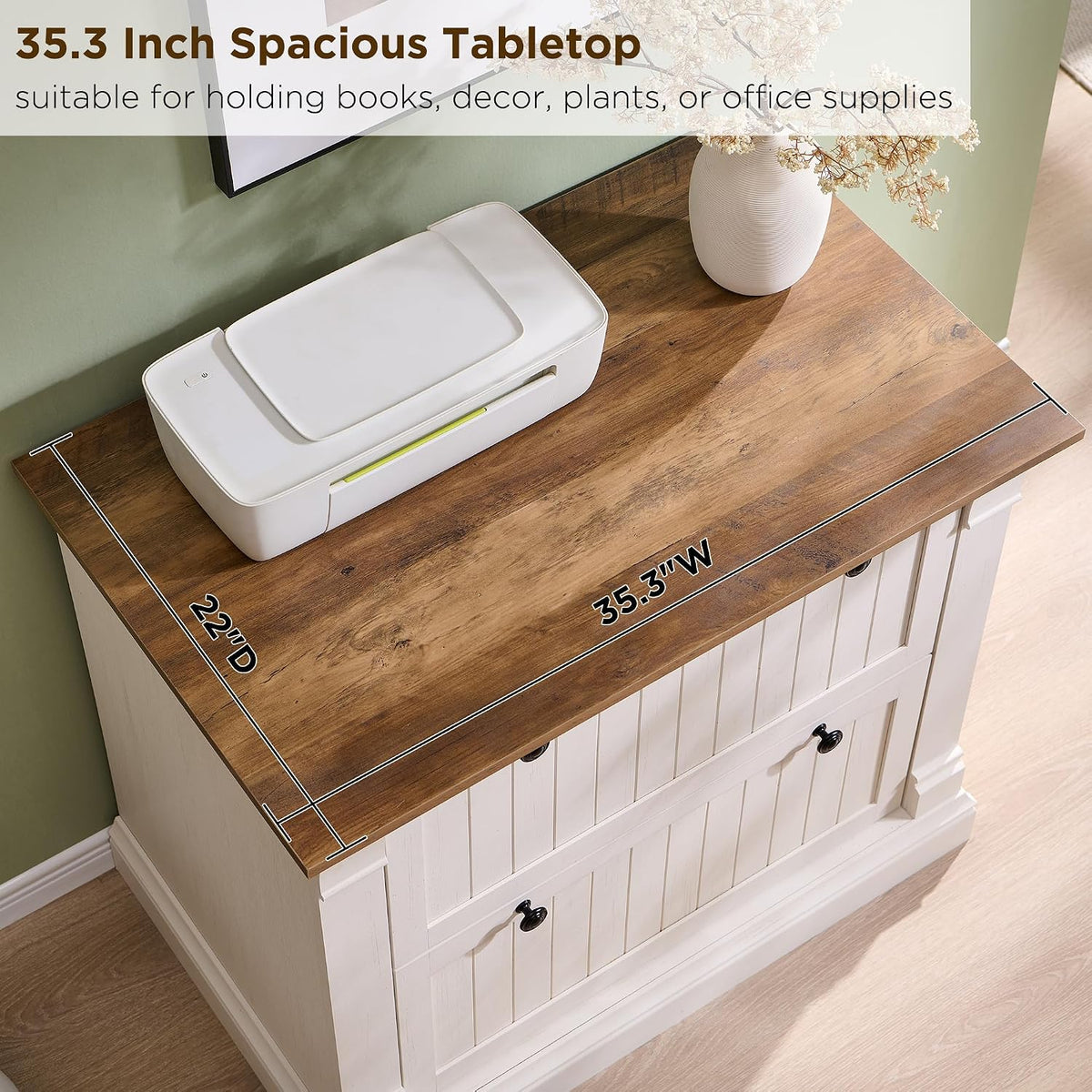 Top-down view of faux wood tabletop with 35.3" x 22" markings holding a printer and decorative vase
