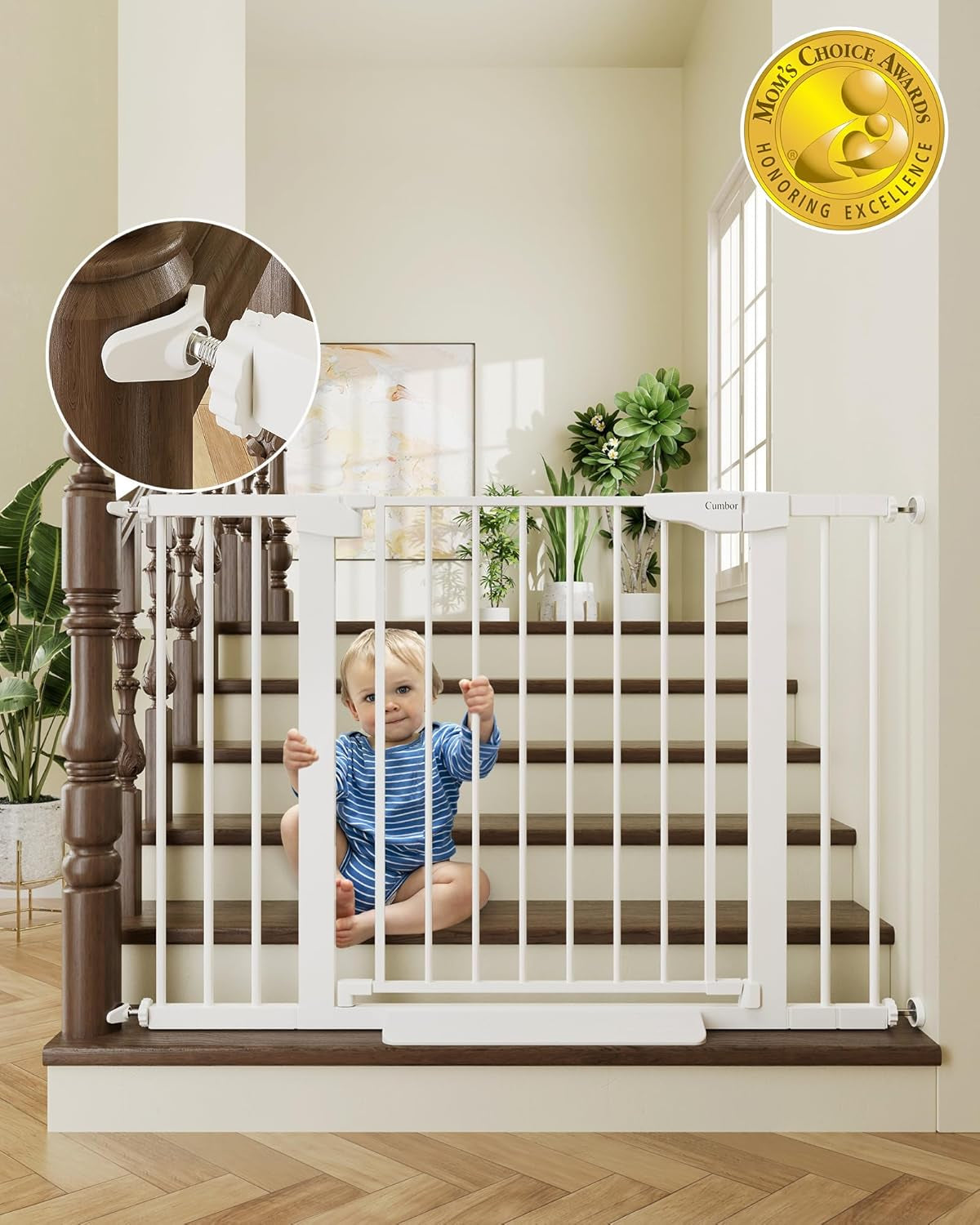 White baby gate blocking stairs with a toddler sitting behind the bars and a close-up inset of the wall anchor.