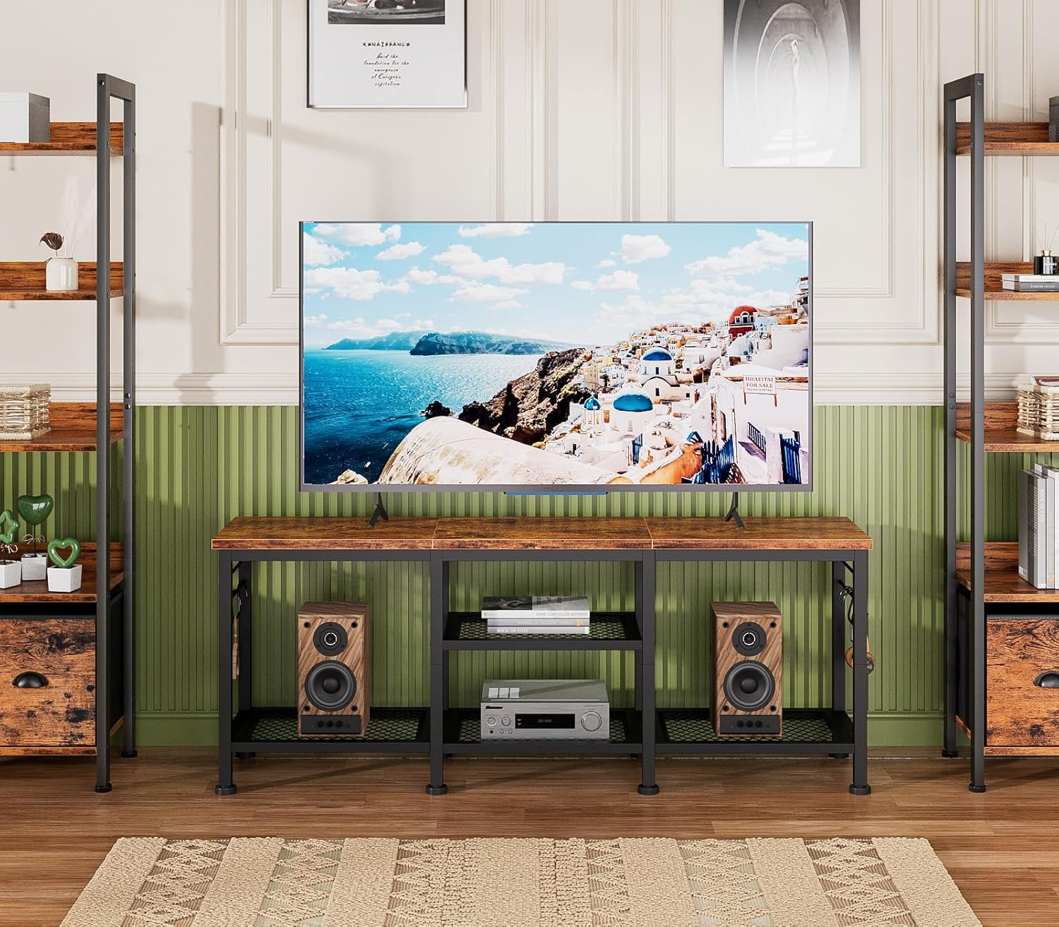 Front view of metal-framed TV console with rustic wood top beneath a large wall-mounted TV.