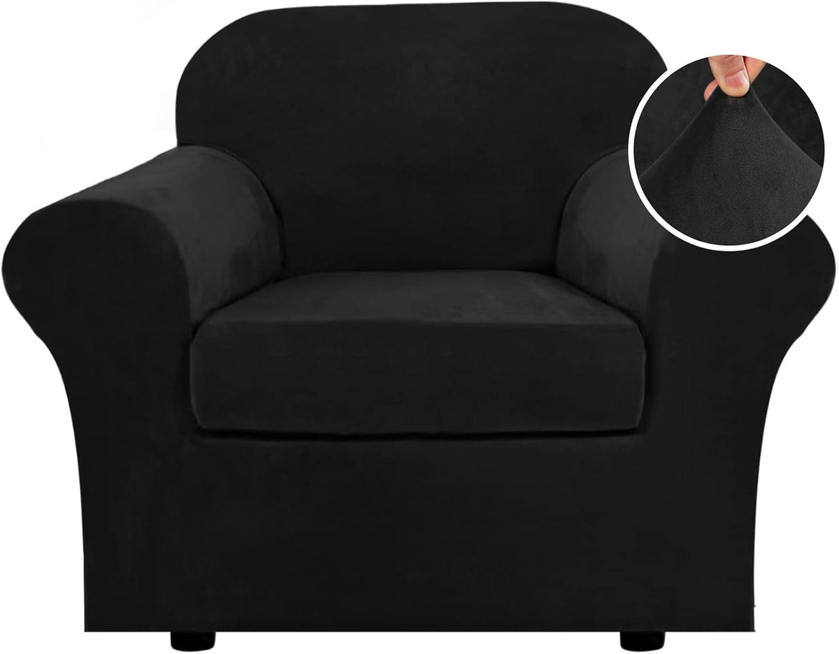 Front view of a single armchair covered in a black stretchy velvet slipcover, inset shows fabric texture pinch