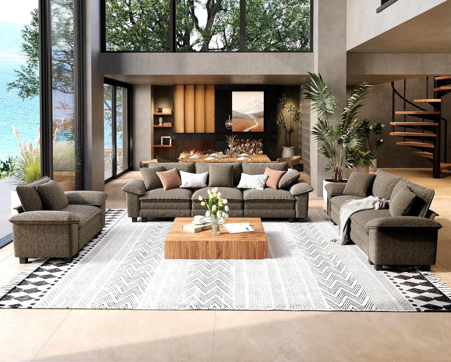Bright living space staged with a brown-gray sofa set, patterned area rug and wood coffee table in front of a fireplace wall.