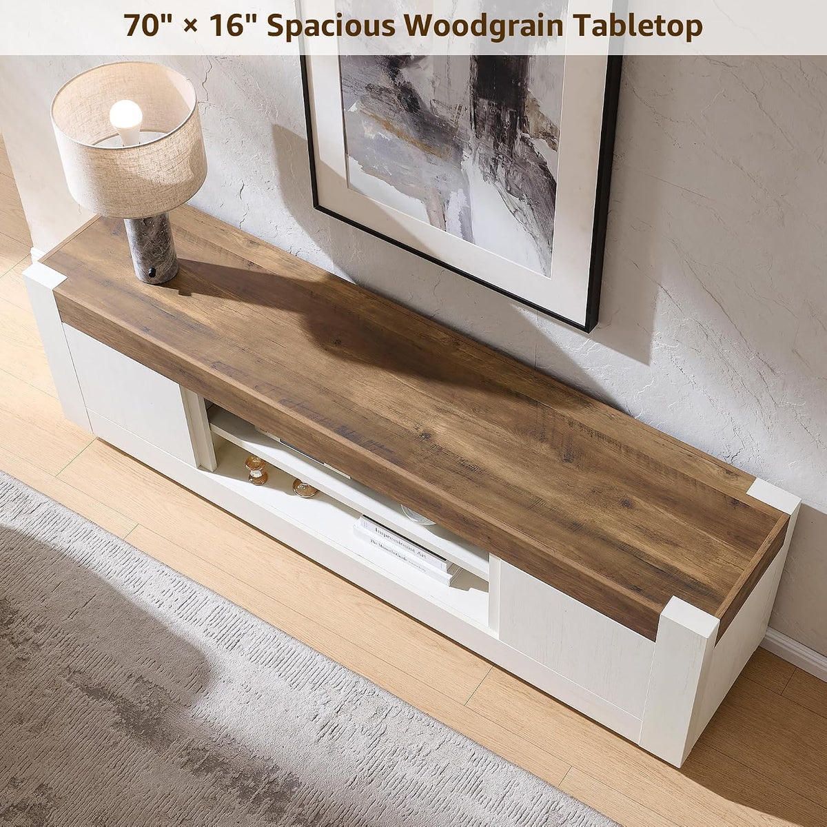Angled overhead view of the wood-grain tabletop on an antique white TV stand