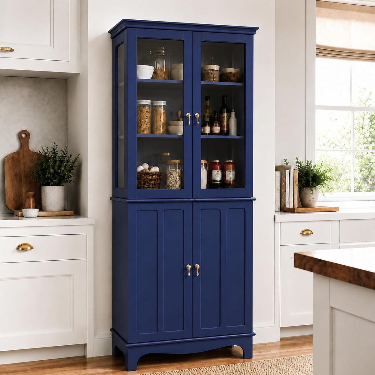 Navy blue tall china cabinet with glass upper doors showing jars and bottles, set between white kitchen cabinets.