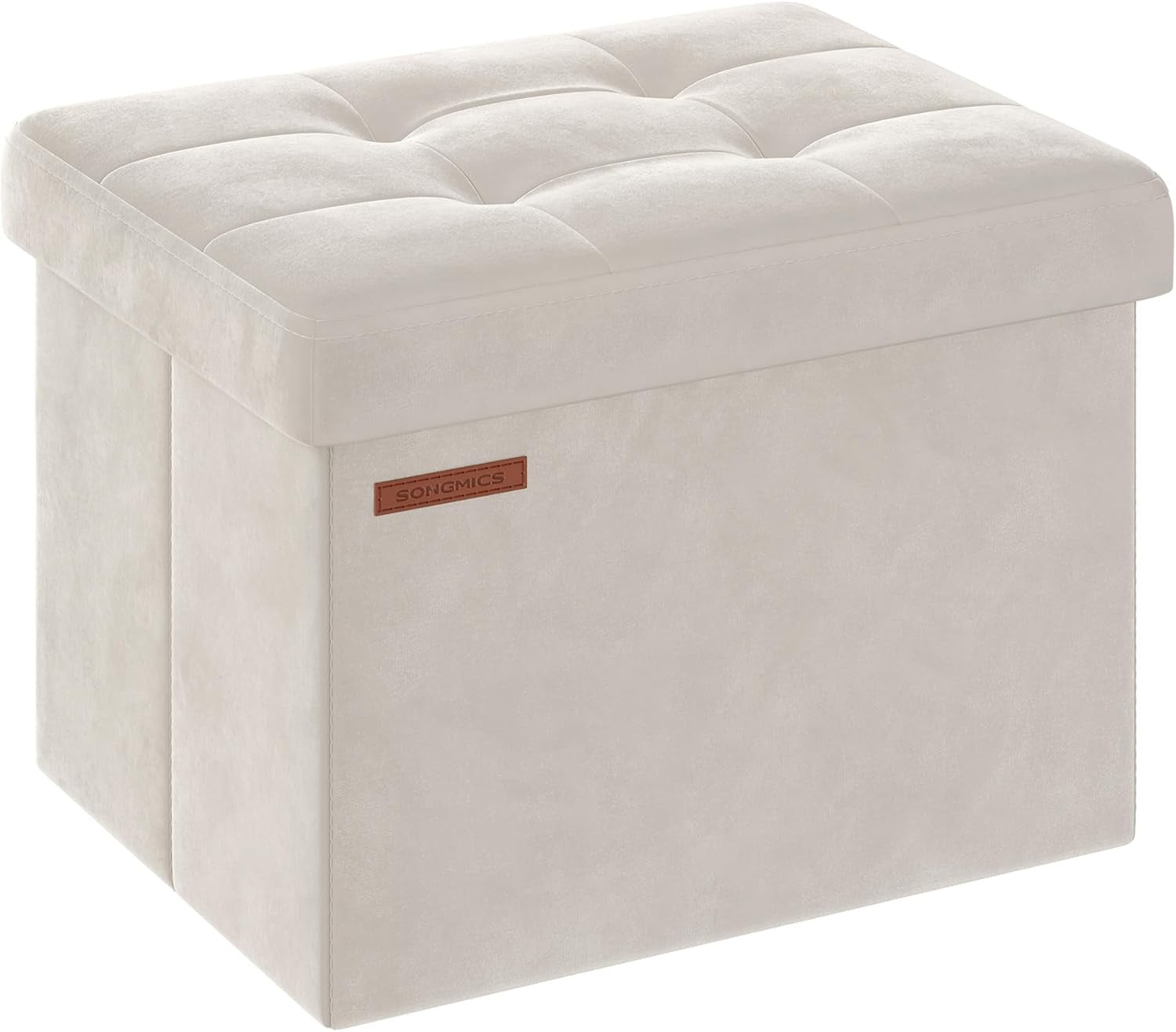Closed tufted storage ottoman in a light cream color shown from a slight angle