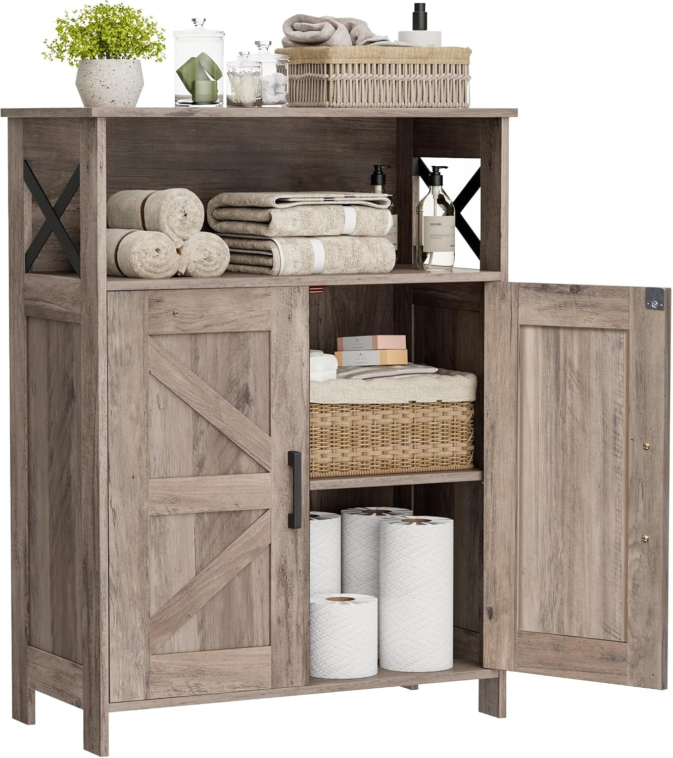Light weathered-wood finish cabinet with one door open showing adjustable shelf and stored towels and toilet paper