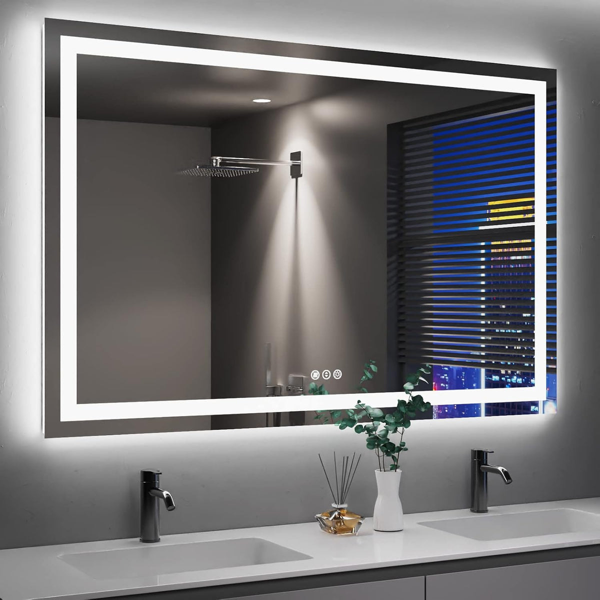 Large horizontal LED mirror glowing on a gray wall above a double sink with cityscape reflected.
