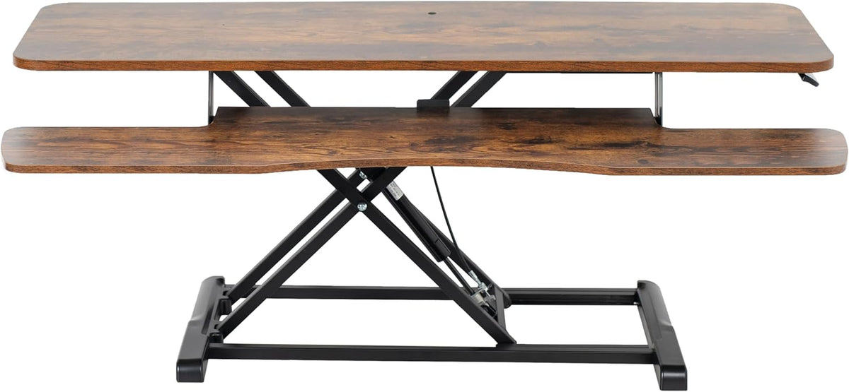 Front view of a height-adjustable desk converter with wood-grain top and keyboard tray