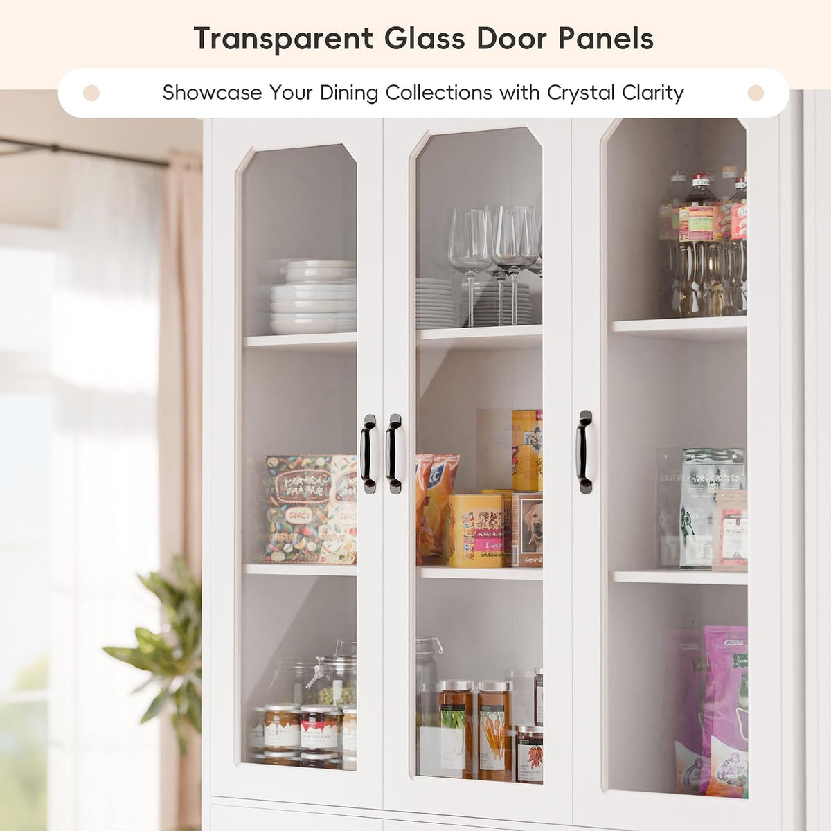 Close-up of the three transparent door panels and black metal handles with displayed dishes and pantry items inside