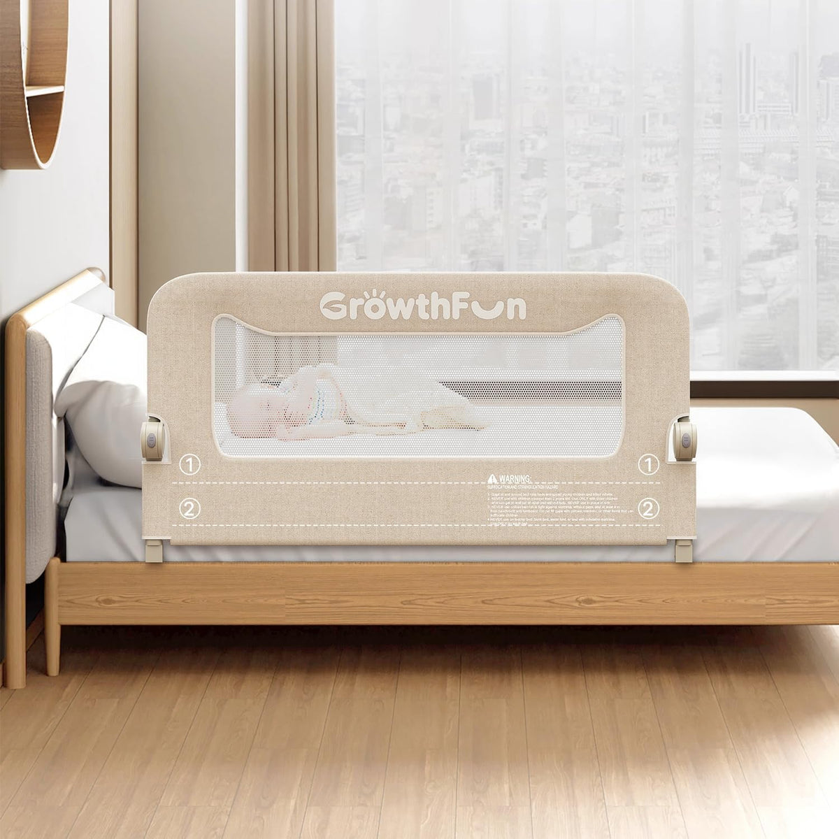 Centered close front view of a beige fabric bed rail showing mesh window and side locks on a wooden frame