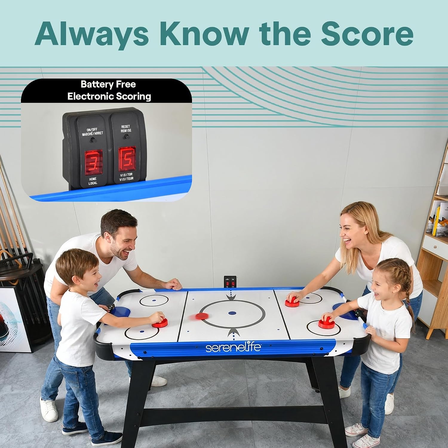 Overhead view of two adults and two children playing with battery-free electronic LED scoreboard inset