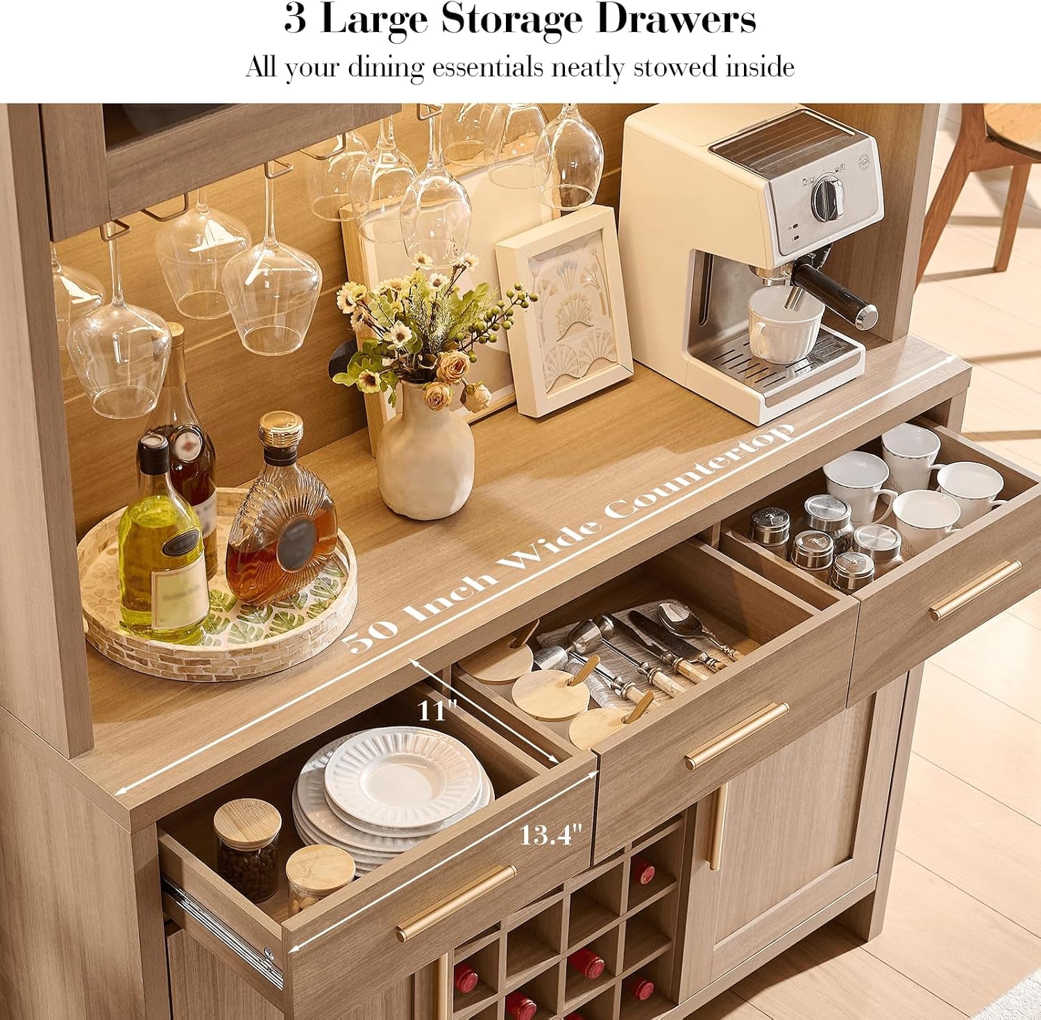 Top-down view of the countertop area with three open drawers showing utensil and plate storage beneath the wine-glass rack