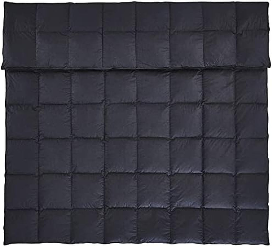 Top-down view of the black comforter laid flat to show grid baffle-box stitching across the surface
