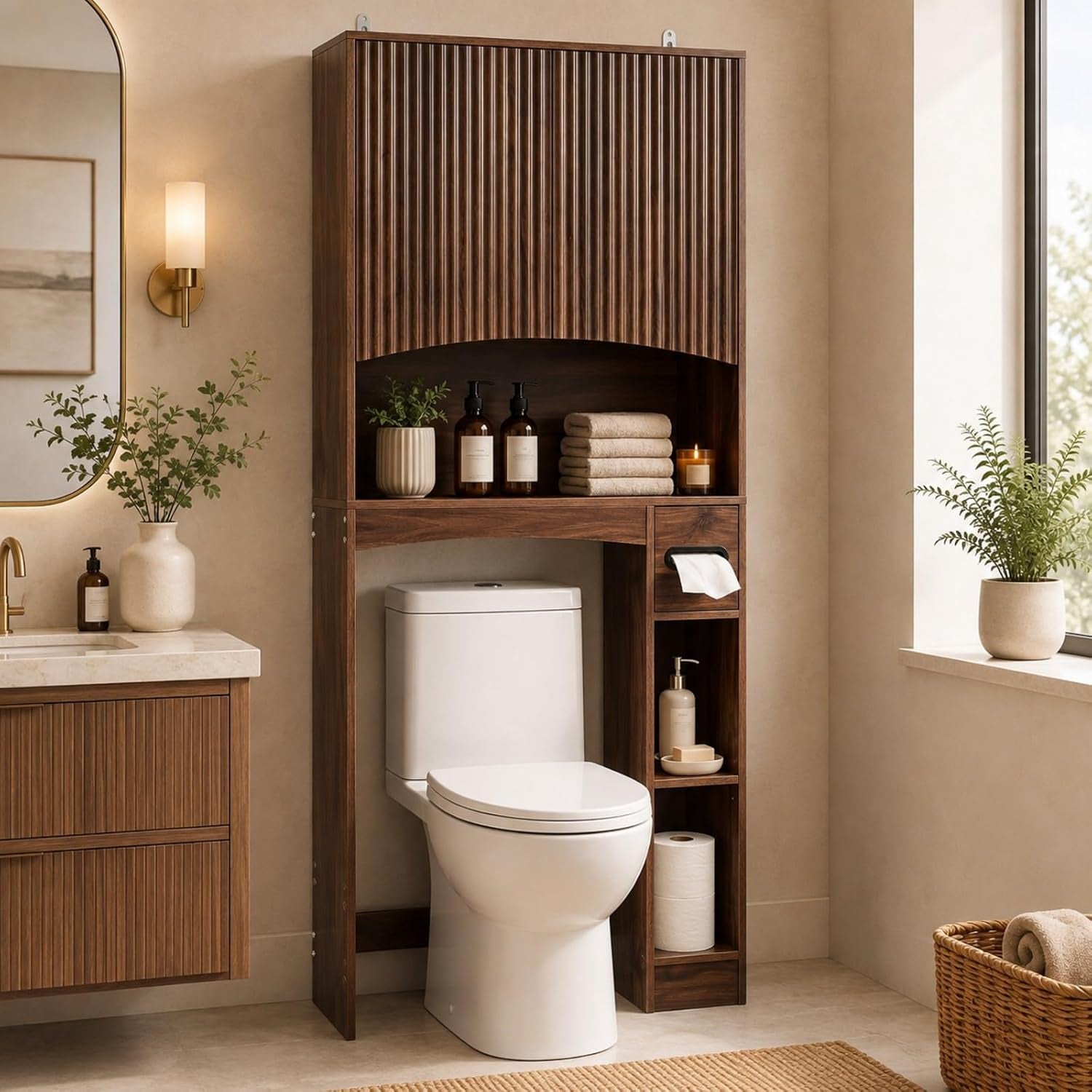 Tall over‑toilet storage unit with vertical fluted upper panel and side cubbies beside a white toilet.