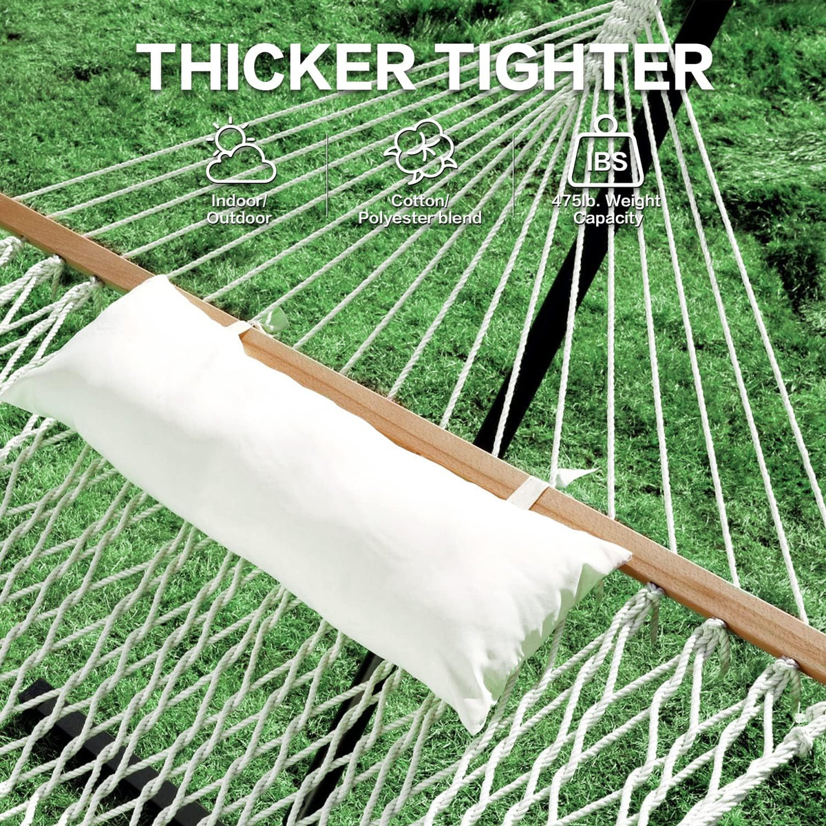 Close-up of an extra-large white pillow resting on a natural rope hammock across a hardwood spreader bar
