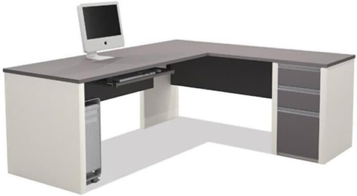 Angled front view of L-shaped desk showing keyboard tray, CPU stand at left and three-drawer pedestal at right.