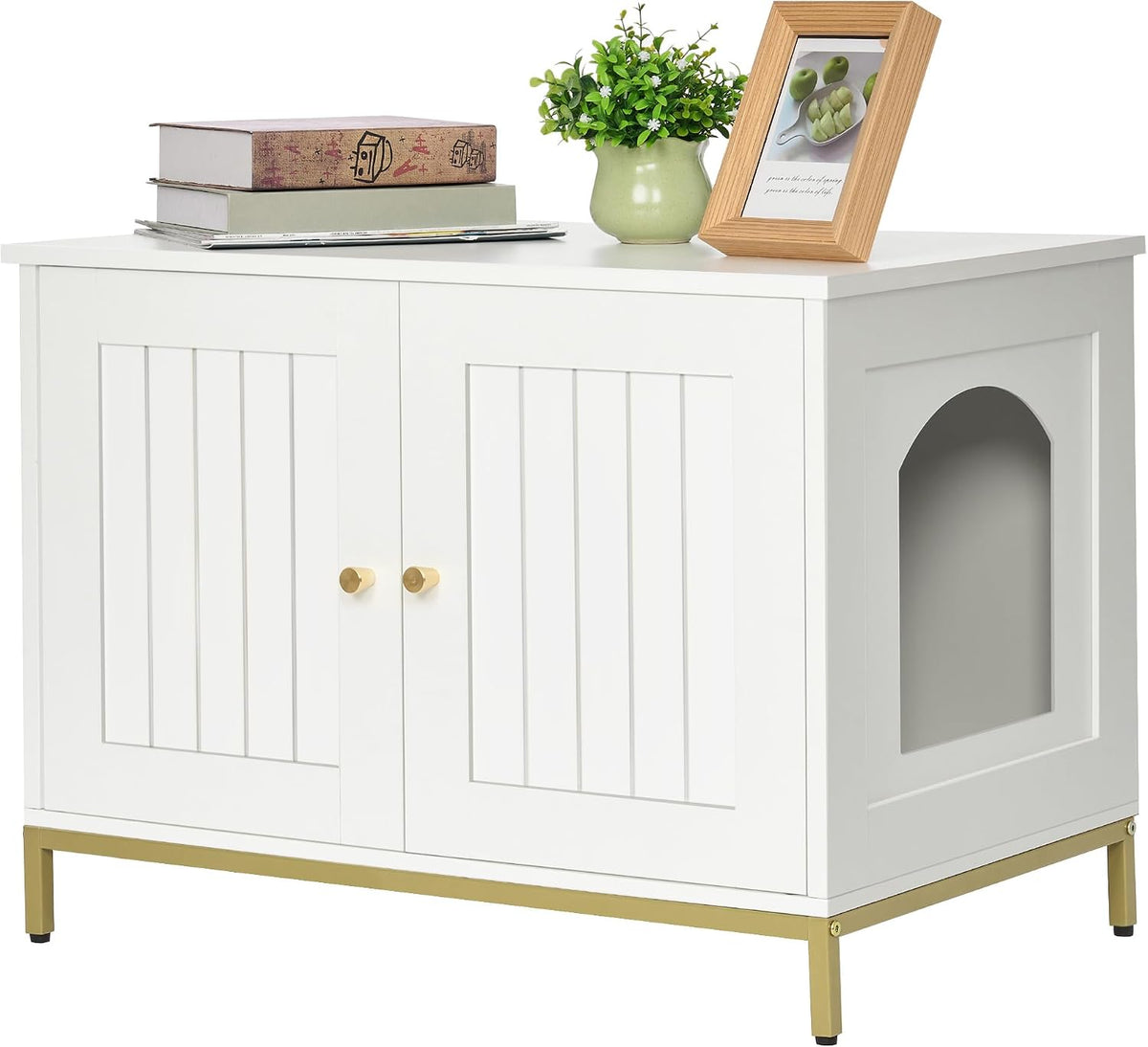 Three-quarter front view of the white litter box cabinet with gold metal legs and decor on top.