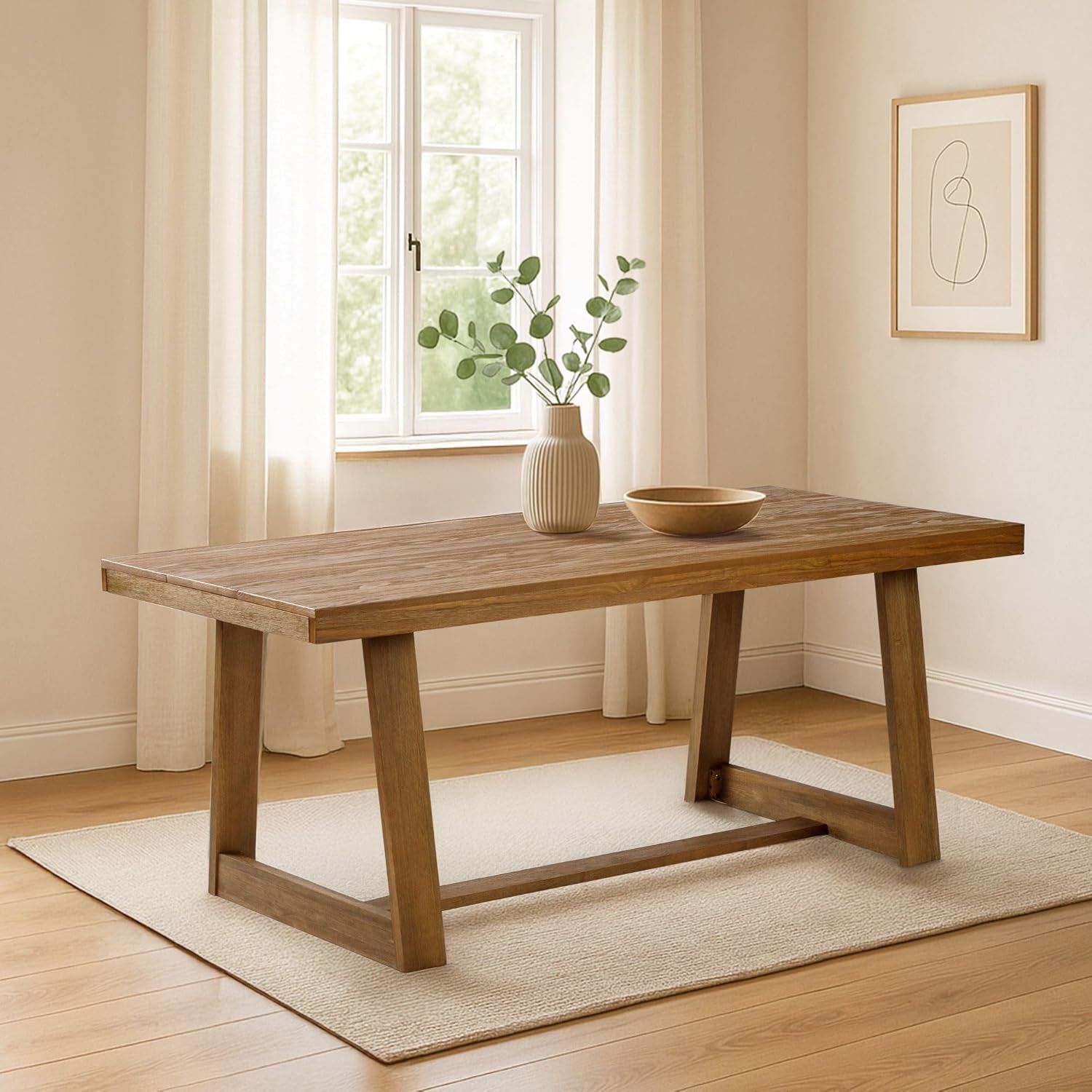 Solid pine farmhouse dining table in a warm room angled front view showing trestle-style legs