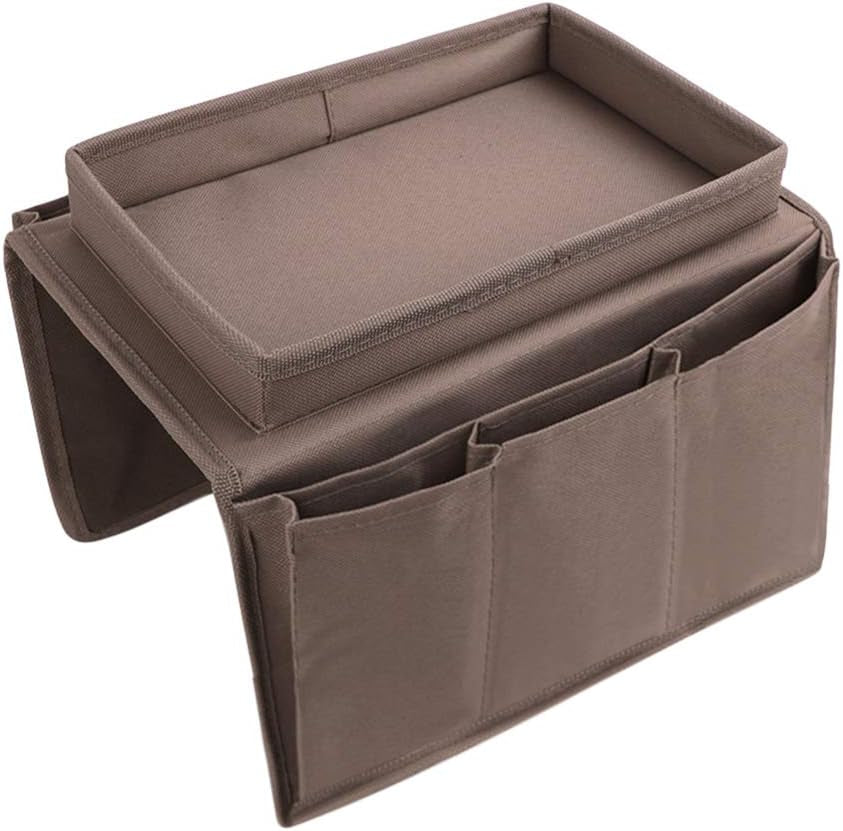 Studio shot of empty brown fabric armrest caddy showing top tray and three front pockets