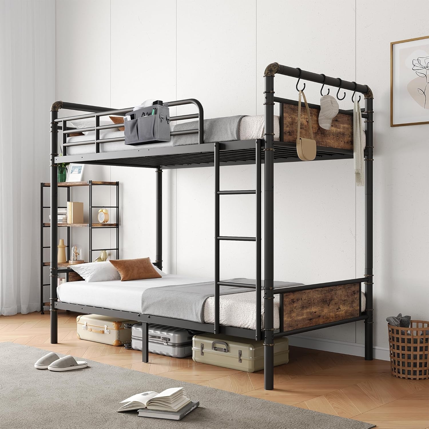 Assembled twin-over-twin metal bunk with ladder, wood-look panels, hooks and storage suitcases under the lower bed in a